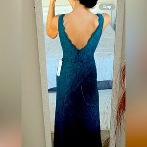 Bridesmaid dress size 4. Floor length lace material peacock color